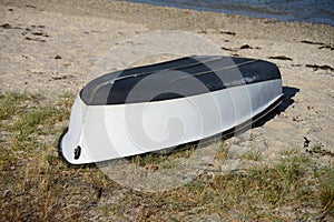 Wooden fishing boat dries ashore