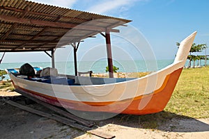 Wooden fishing boat at repair dock