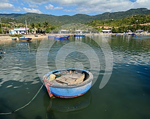 Wooden fishing boats on lake in Phuyen, Vietnam.