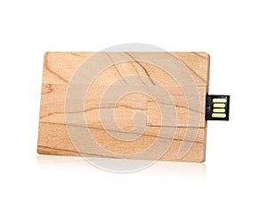 Wooden flash drive isolated on white background. USB stick made from wood material in card concept style.  Clipping path