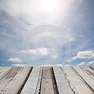 Wooden floor with beautiful blue sky scenery for background