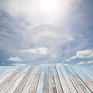 Wooden floor with beautiful blue sky scenery for background