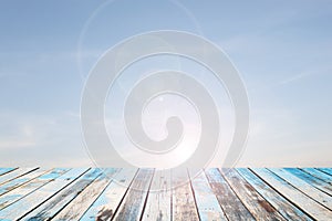 Wooden floor with beautiful blue sky scenery for background