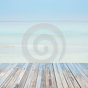 Wooden floor with beautiful ocean and blue sky retro pastel sce