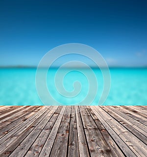 Wooden floor and blue sea