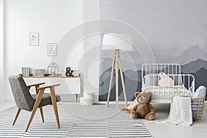 Monochromatic scandinavian child`s bedroom interior photo
