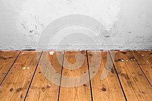 Wooden floor and white wall photo