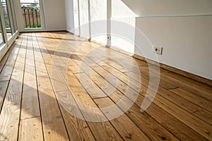 Wooden floor and white wall