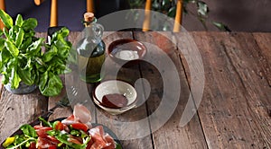 wooden food background table with basil