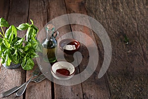wooden food background table with basil