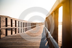 Wooden foot bridge in the beach