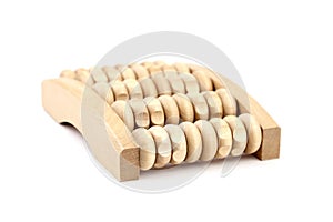 Wooden foot massage roller isolated on white