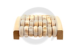 Wooden foot massage roller isolated on white