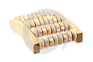 Wooden foot massage roller isolated on white