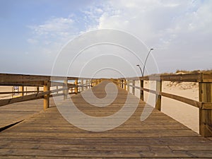 Wooden footbridge on the beach