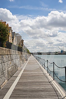 Wooden footbridge in front of terrace houses in Kent