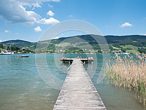 Wooden footbridge at Mondsee in Austria