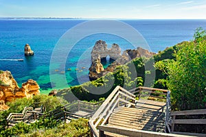 Wooden footbridge to secret beach near Lagos on Ponta da Piedade. Portugal