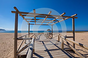 Wooden footpath pergola of Varadero Beach in Canos Meca photo