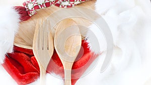Wooden Fork and Spoon on Christmas concept background