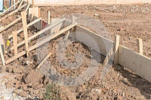 Wooden formwork concrete strip foundation for a new house