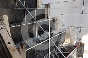 wooden formwork and steel bar ready for concrete stairs construction