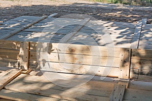 Wooden formworks for concrete at construction site.