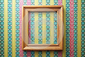 Wooden frame on color wallpaper photo