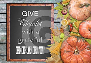 Wooden frame and fruits and give thanks with a grateful heart photo