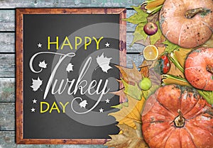 Wooden frame and fruits for happy turkey day