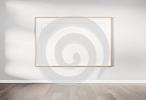 Wooden frame hanging on a wall mockup 3d rendering