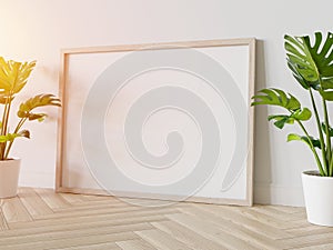 Wooden frame leaning on floor in interior mockup. Template of a picture framed on a wall 3D rendering