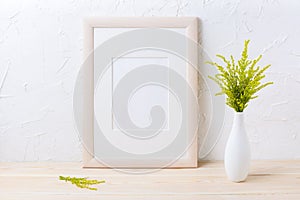 Wooden frame mockup with ornamental grass in exquisite vase