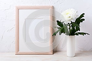 Wooden frame mockup with white chrysanthemum in vase