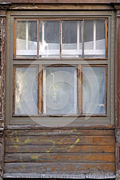 wooden frame of an old window in a not renovated house