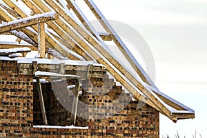 Wooden frame of the roof during construction works on a new house