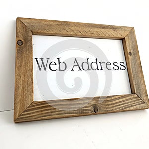 Wooden frame with a web address isolated on white background photo