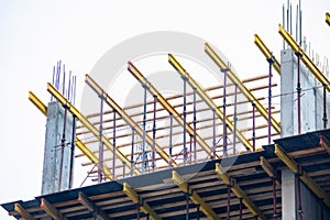 Wooden frames and metal reinforcement at new building construction site