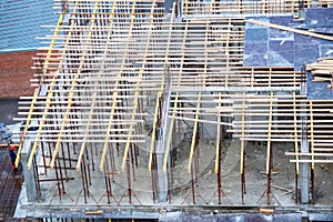 Wooden frames and metal reinforcement at new building construction site