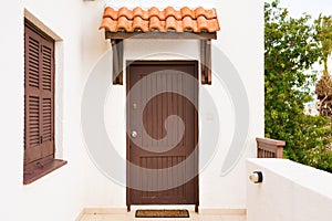 Wooden front door of a home. Front view