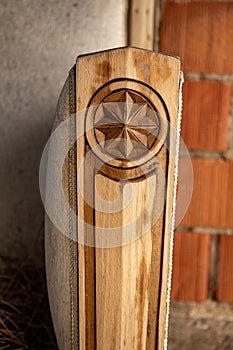 Wooden furniture made of natural materials in the garden. old wooden furniture in the vintage inlaid detai