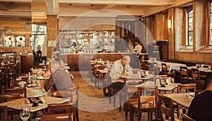 Wooden furniture and tiles floor in retro style restaurant, at bright day before lunch