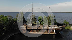 The wooden Galleon barge, ship, on the bank of Mezhyhirya park, Ukraine