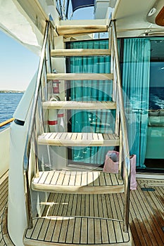 Wooden gangway on a luxury yacht to the upper deck Red Sea