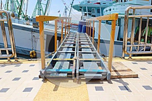 Wooden gangway to board fishing boat