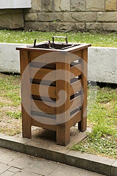 Wooden garbage can in the park