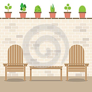 Wooden Garden Chairs With Table And Pot Plants