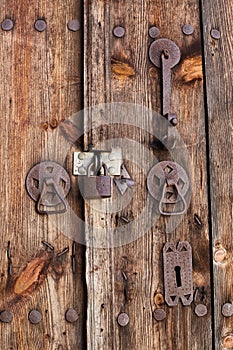 Wooden gate with a padlock