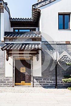 wooden gate and streetlamp