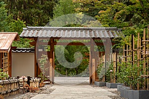 Wooden gate to Japanese Garden